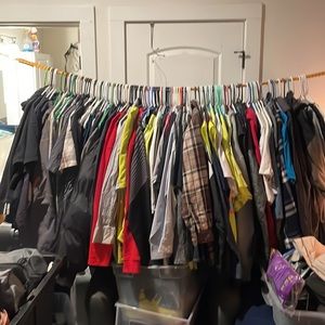 A whole bunch of clothes that’s not even 1/4 of them